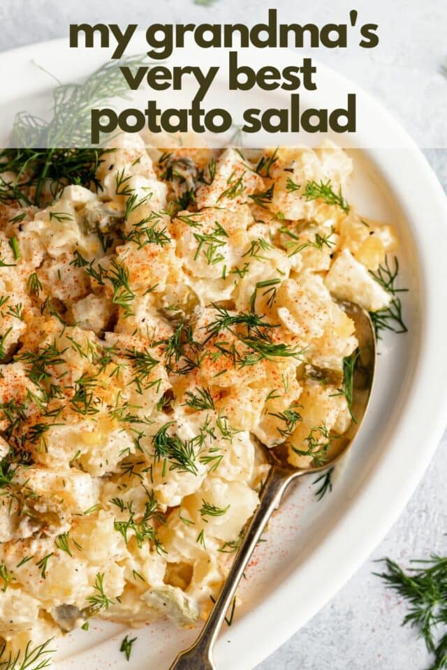 classic potato salad recipe topped with dill and paprika