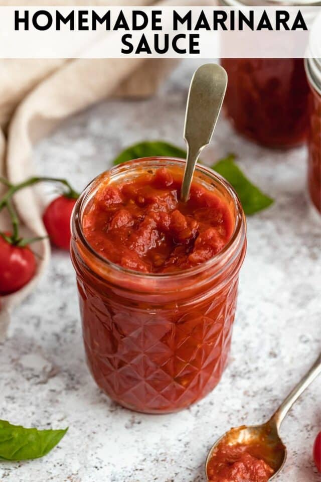 marinara sauce in a small jar with a spoon