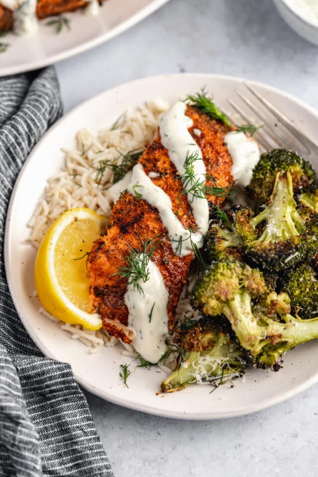 grilled salmon served with rice and roasted broccoli