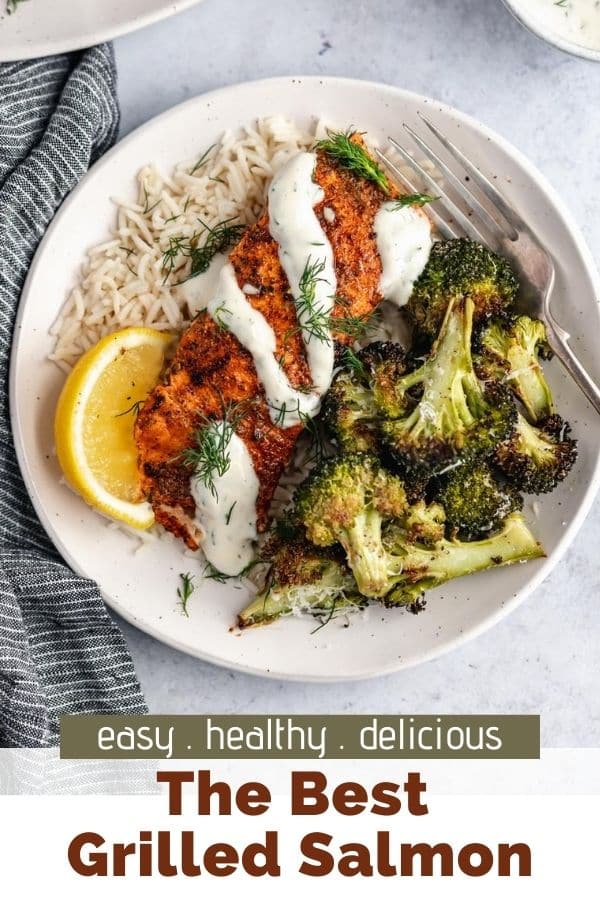 grilled salmon served with lemon dill sauce, rice and roasted broccoli