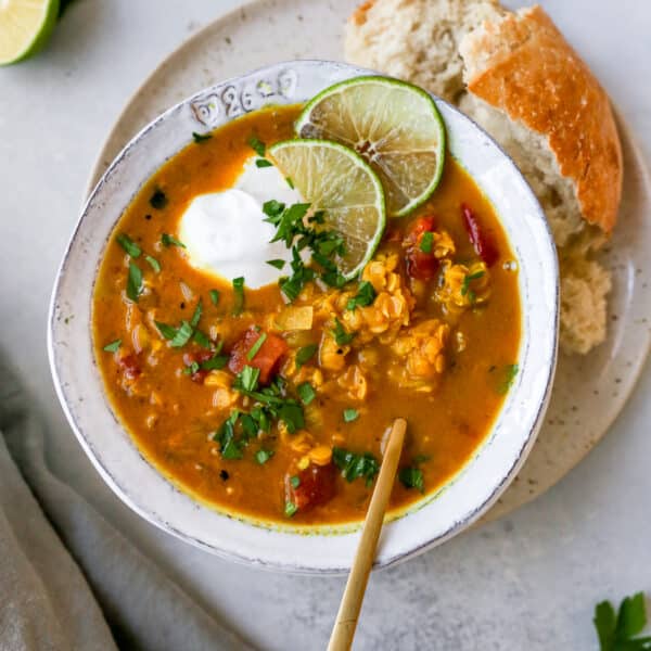 red lentil soup served with crusty bread