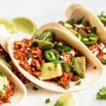 Turkey tacos with avocado and jalapeños.