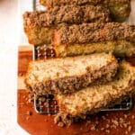 Loaf of apple bread cut into slices.