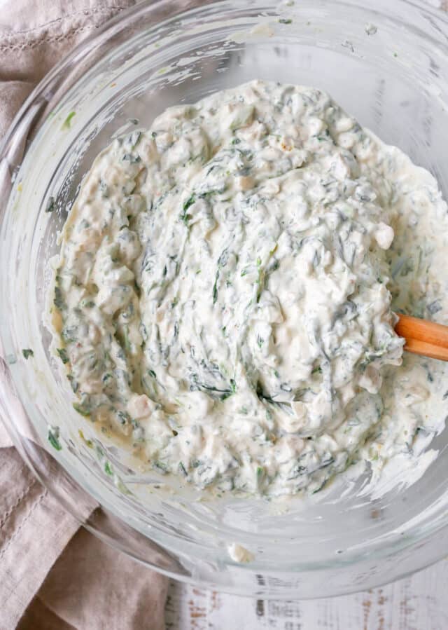 stir all spinach dip ingredients in a large mixing bowl until smooth and creamy