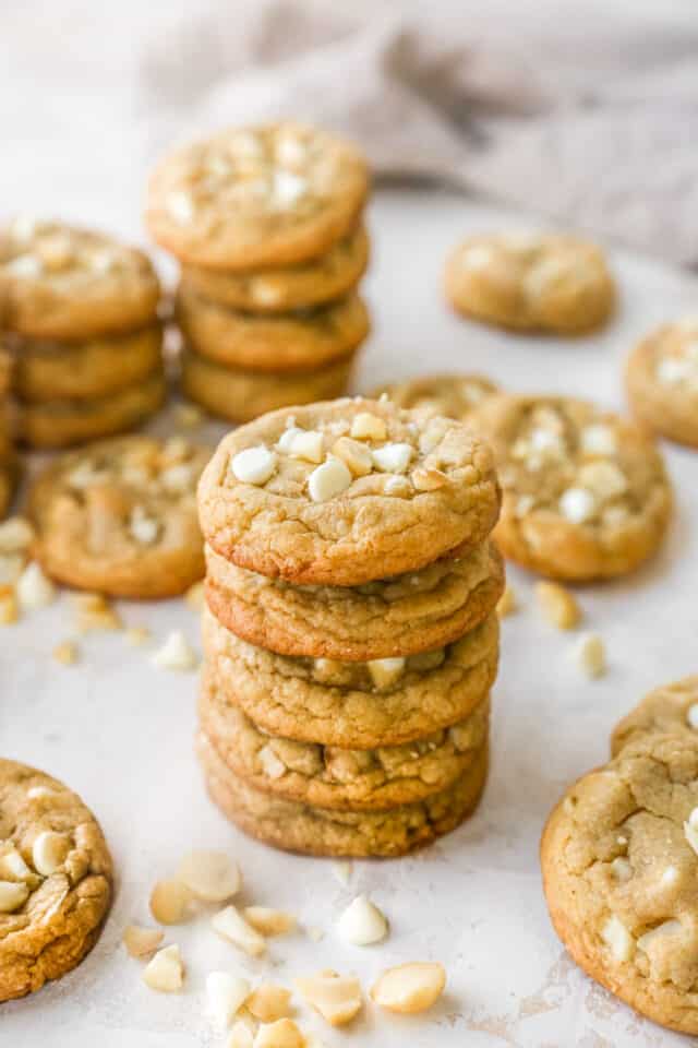 a stack of white chocolate macadamia nut cookies