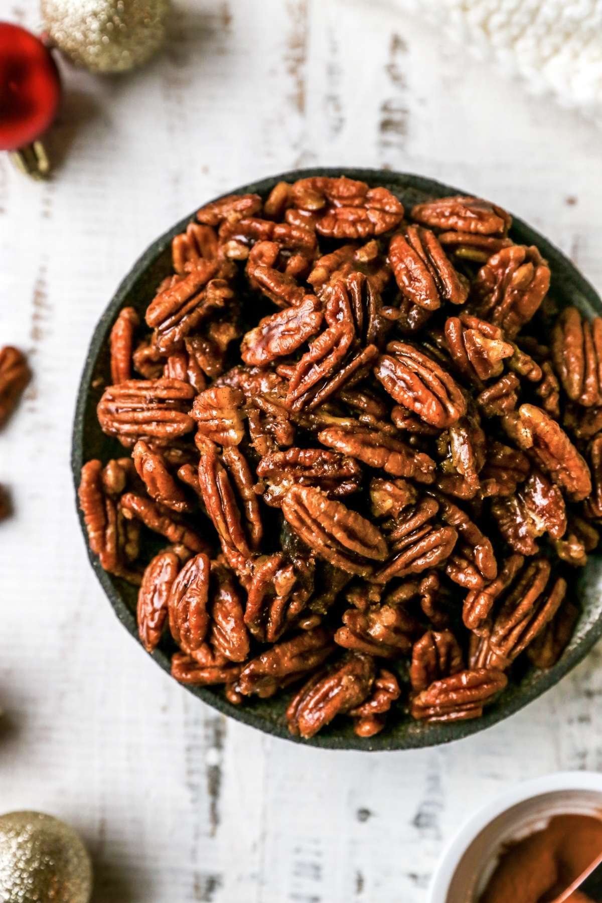 Candied pecans in a bowl.