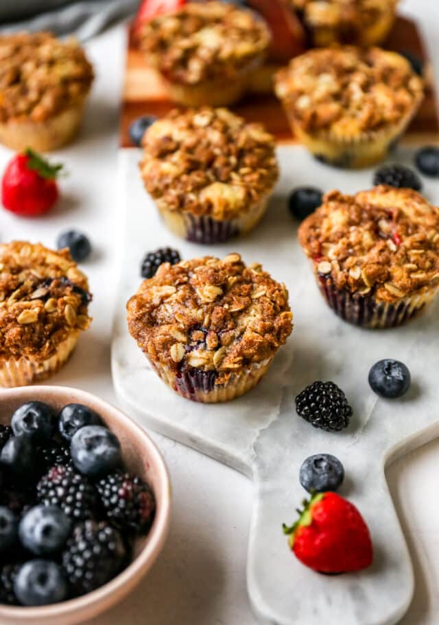 baked berry muffins served with fresh berries