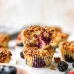 two stacked mixed berry muffins