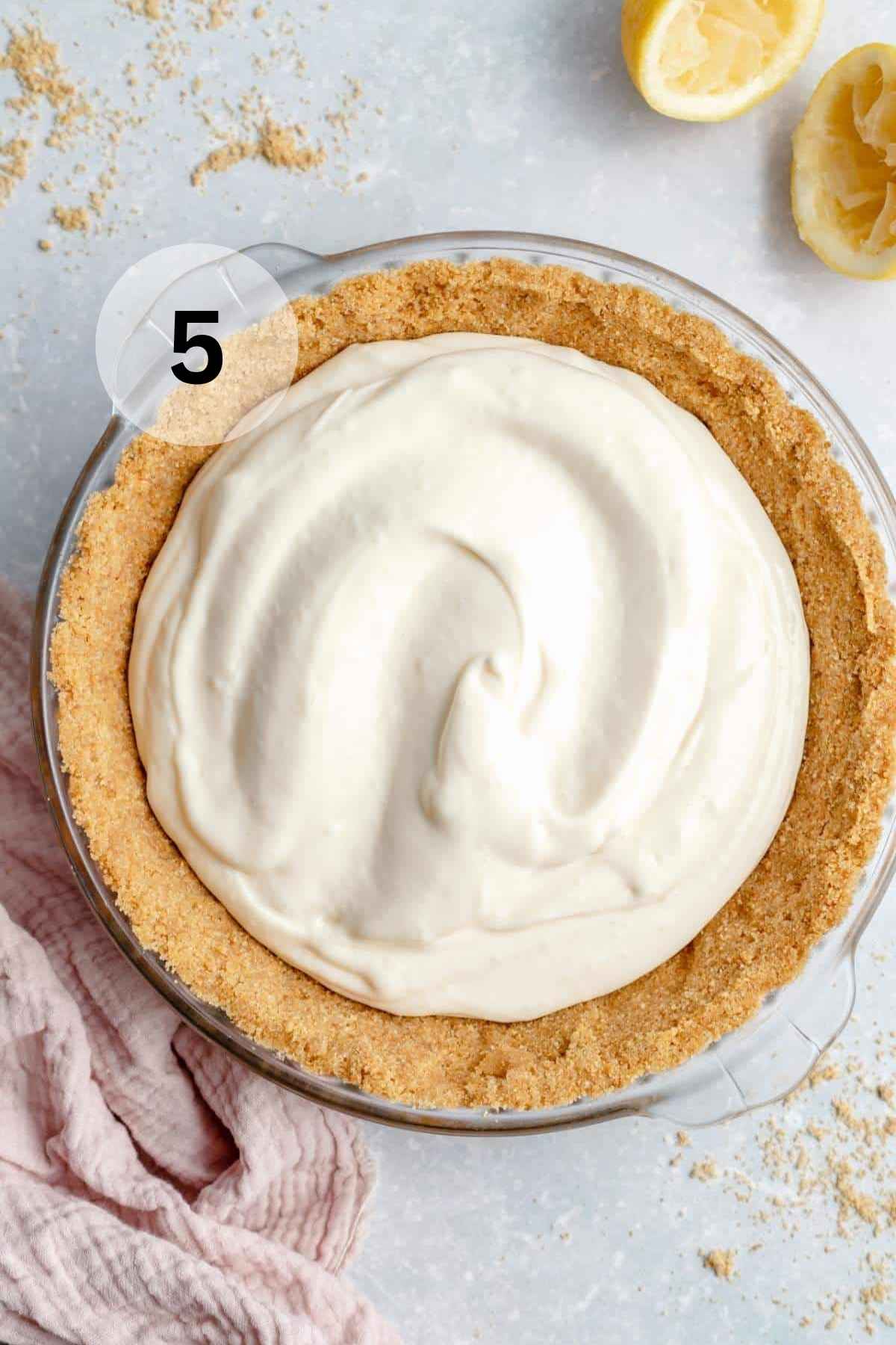 Cream cheese filling in a graham cracker crust.