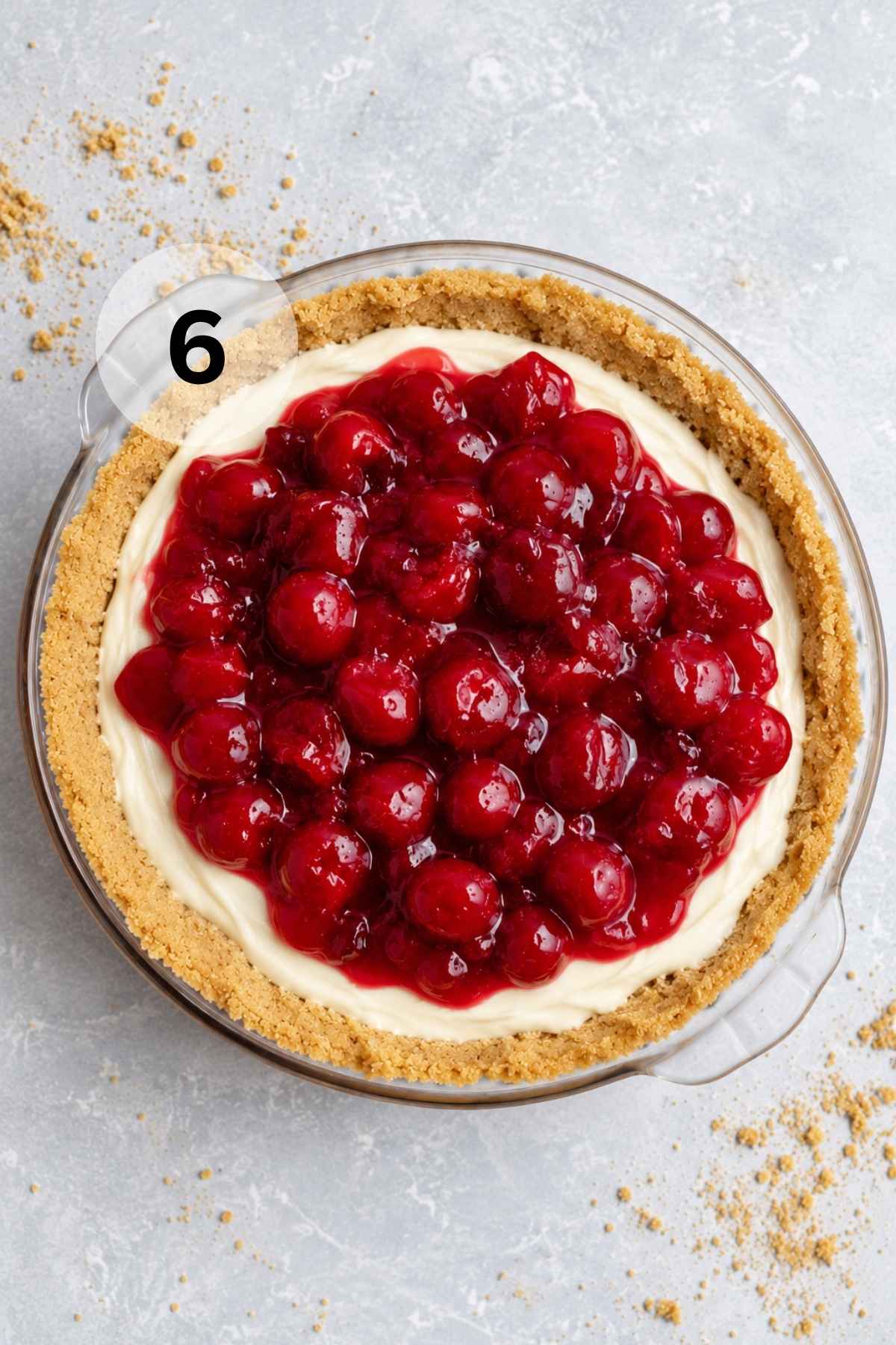 No bake cheesecake with cherry topping.