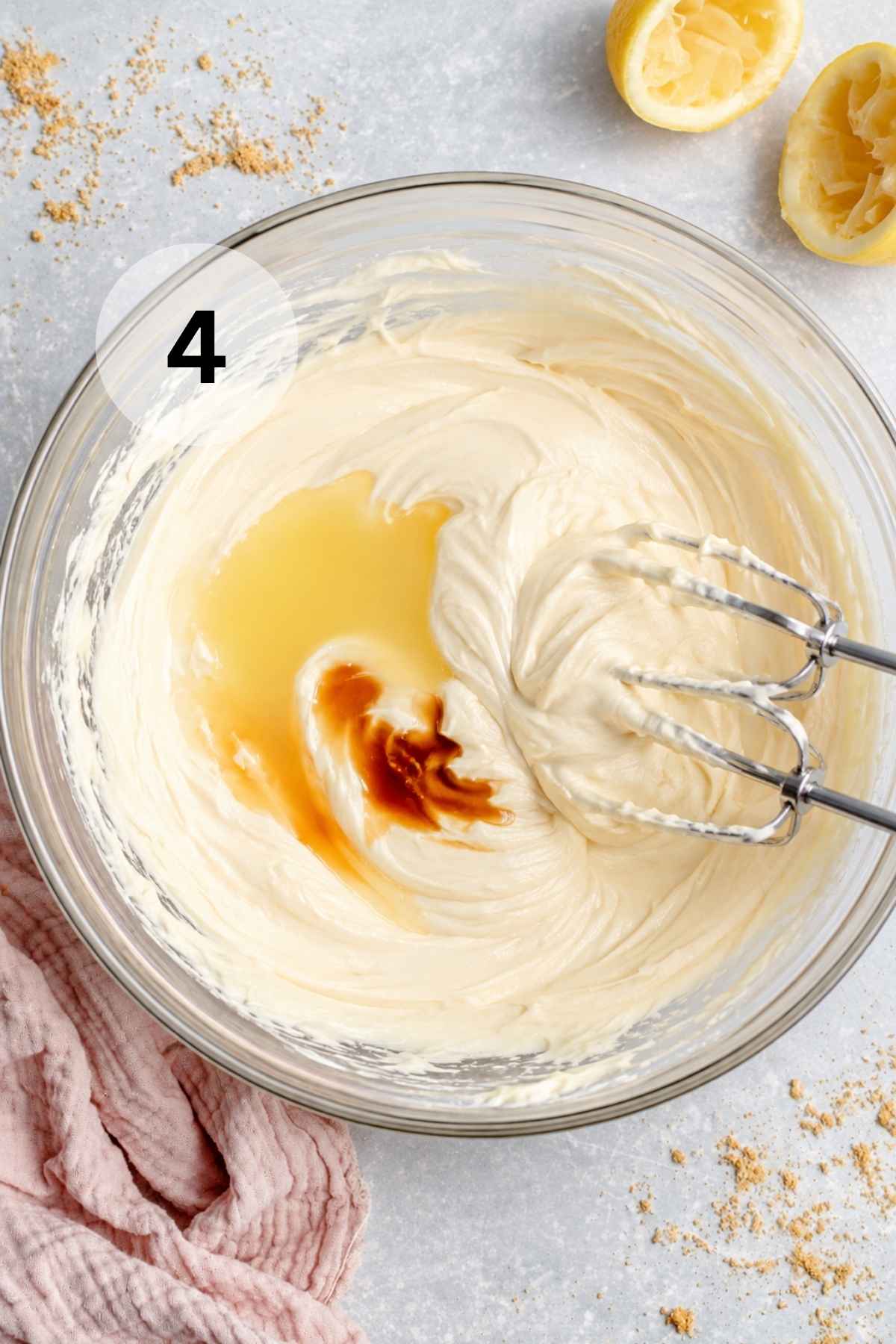 Beating lemon juice and vanilla into cream cheese mixture.