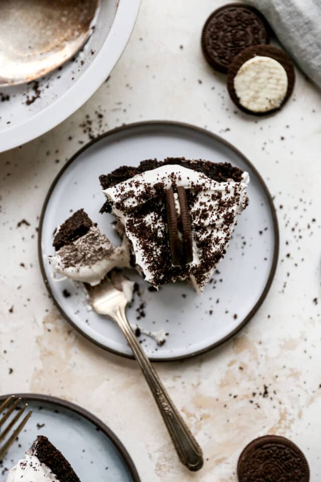 serving of Oreo pie with a piece on a fork