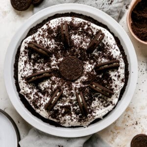 oreo pie with a cool whip filling topped with crushed Oreos