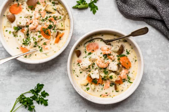 two bowls of seafood chowder