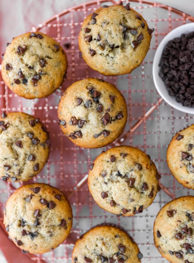 chocolate chip banana muffins on a wire cooling rack