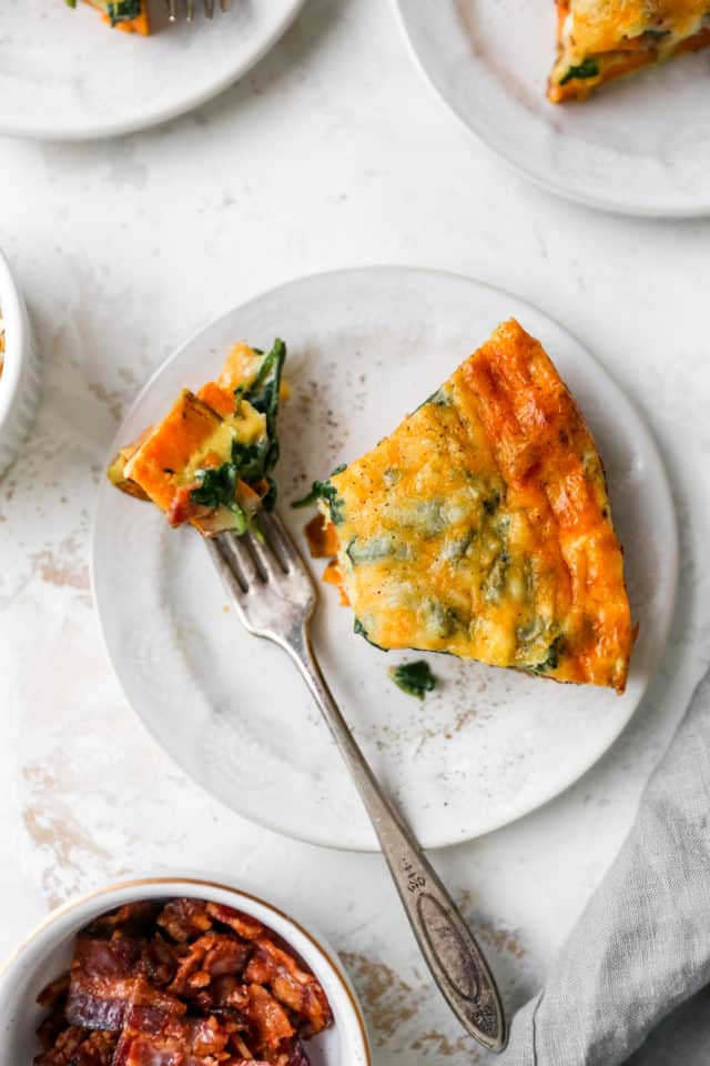 fork in a sweet potato quiche serving