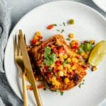 Cod fillet topped with corn salsa.