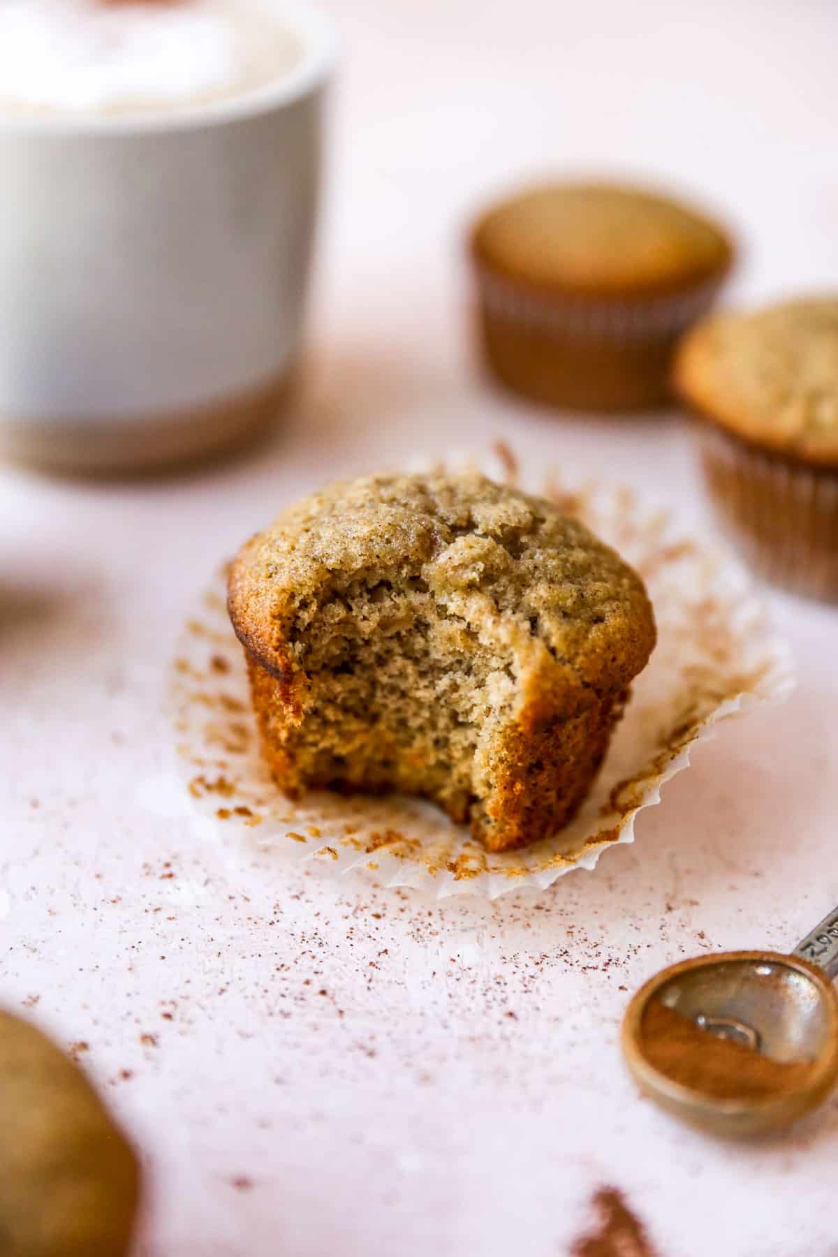 Banana muffin with bite taken out.