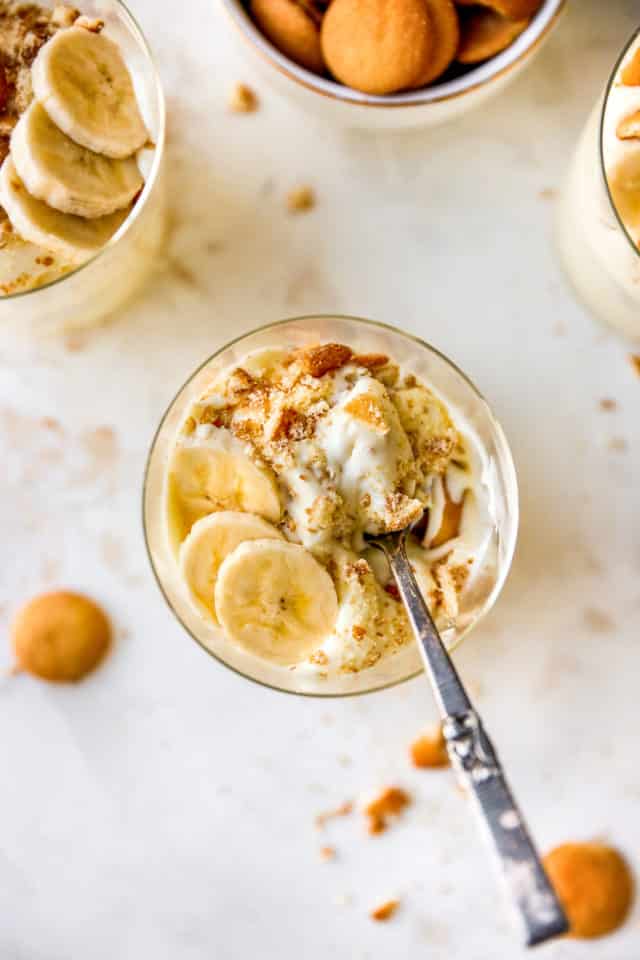 spoon in banana pudding with Nilla wafer crumbs