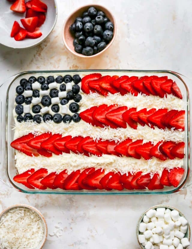 flag cake decorated with strawberries and blueberries
