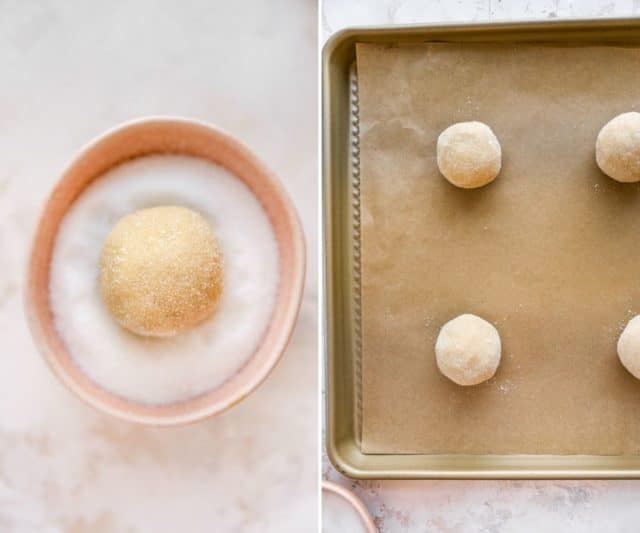 sugar cookie dough ball rolled in sugar and placed on a baking pan