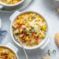corn chowder topped with bacon, cheese and green onions