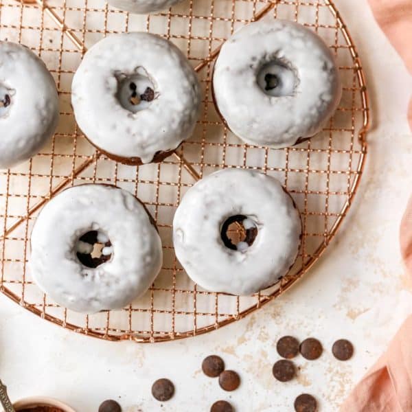 chocolate donuts covered with a white glaze