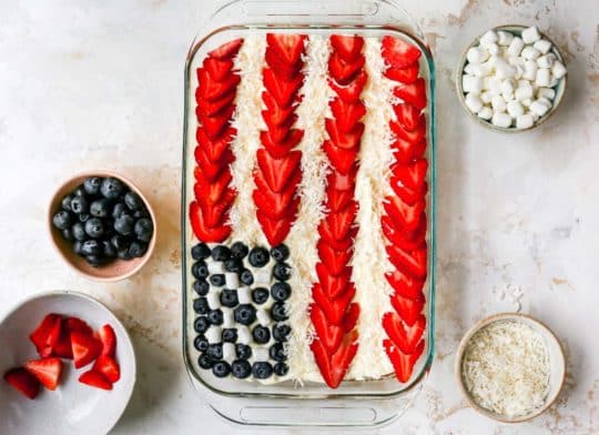Cake decorated with berries to look like the American flag.