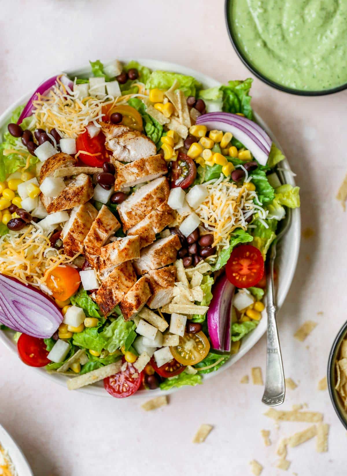 salad with chicken, tomatoes, corn and cheese