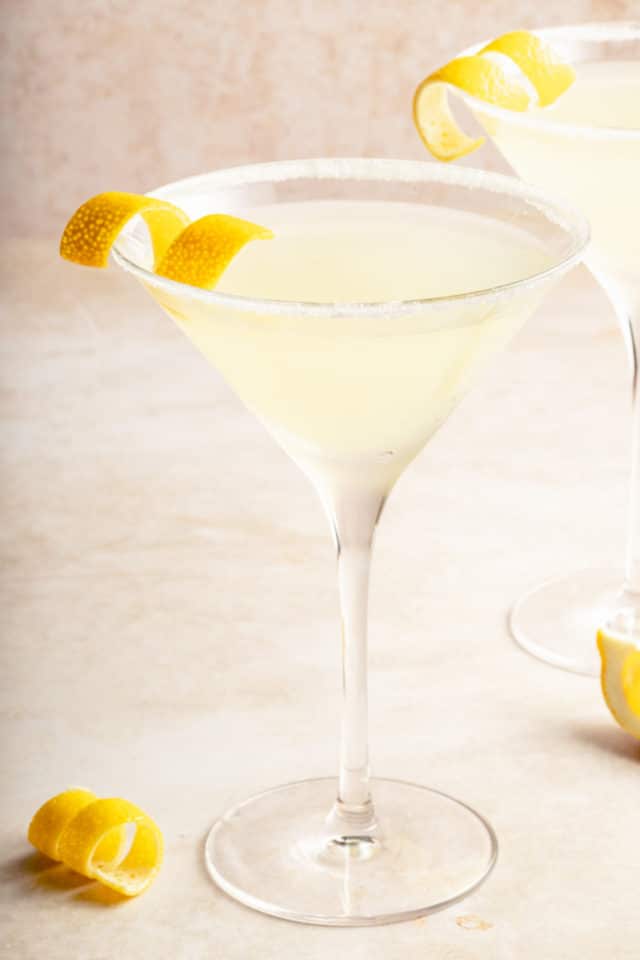 lemon drop martini garnished with a twist of lemon peel