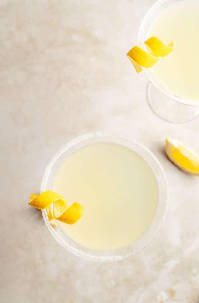 lemon drop martini served in a martini glass with a twist of lemon peel