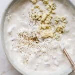 homemade blue cheese dressing topped with extra blue cheese crumbles