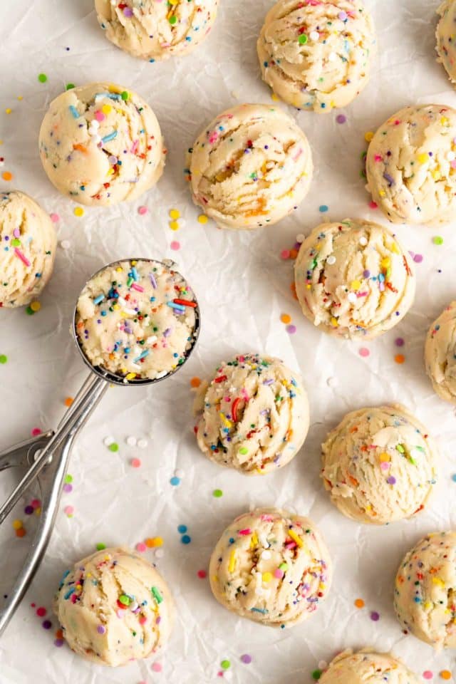 cookie dough with sprinkles in a cookie scoop