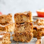 Three servings of apple coffee cake stacked.