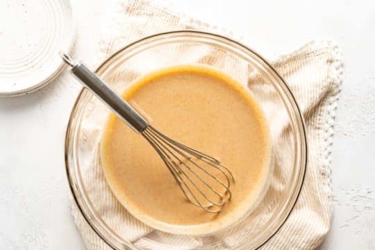 whisking pumpkin puree, condensed milk and spices
