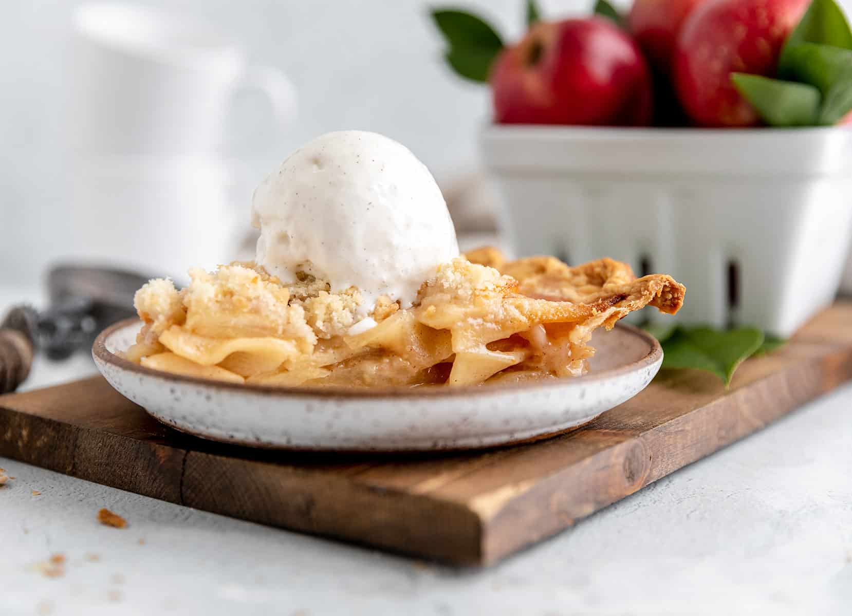Dutch Apple Pie served on a small plate with ice cream