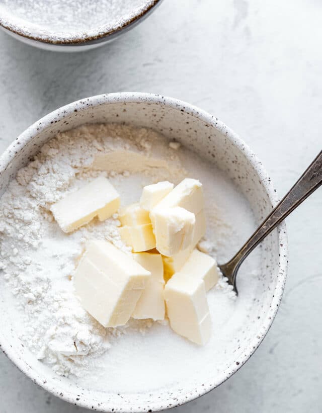 Cubed butter in flour.