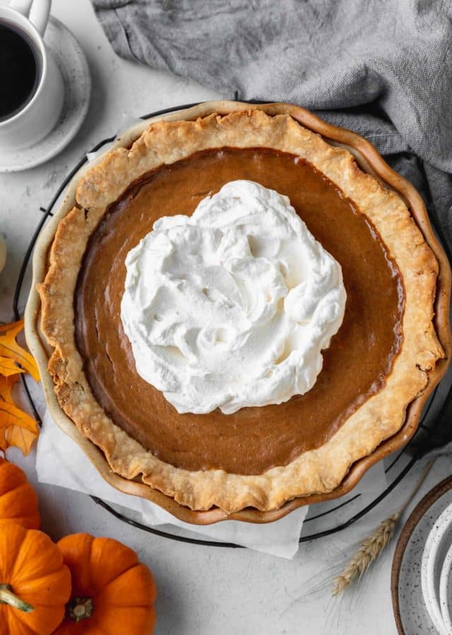 best pumpkin pie in a flaky crust and topped with whipped cream