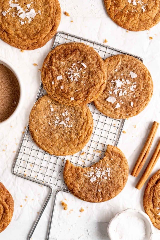 cinnamon cookies on a wire rack to cool
