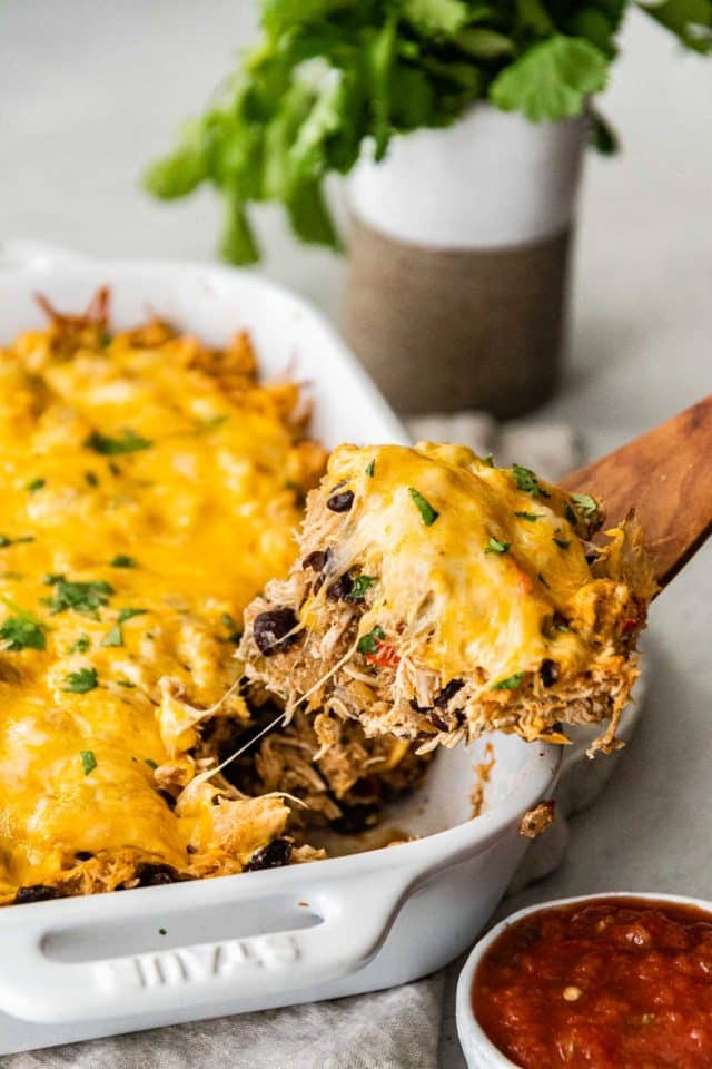 serving Mexican chicken casserole out of a baking dish