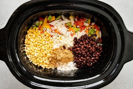 adding all ingredients to a slow cooker