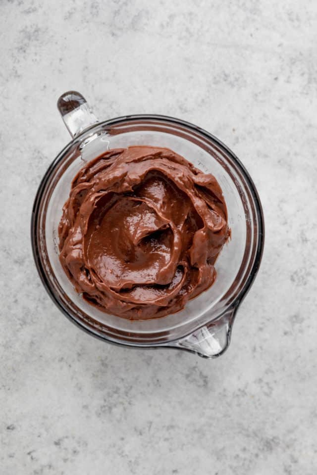 beating milk with chocolate pudding mix