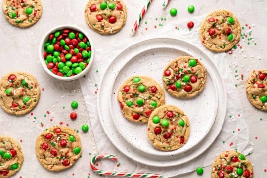 cooked Christmas cookies topped with M&Ms and sprinkles