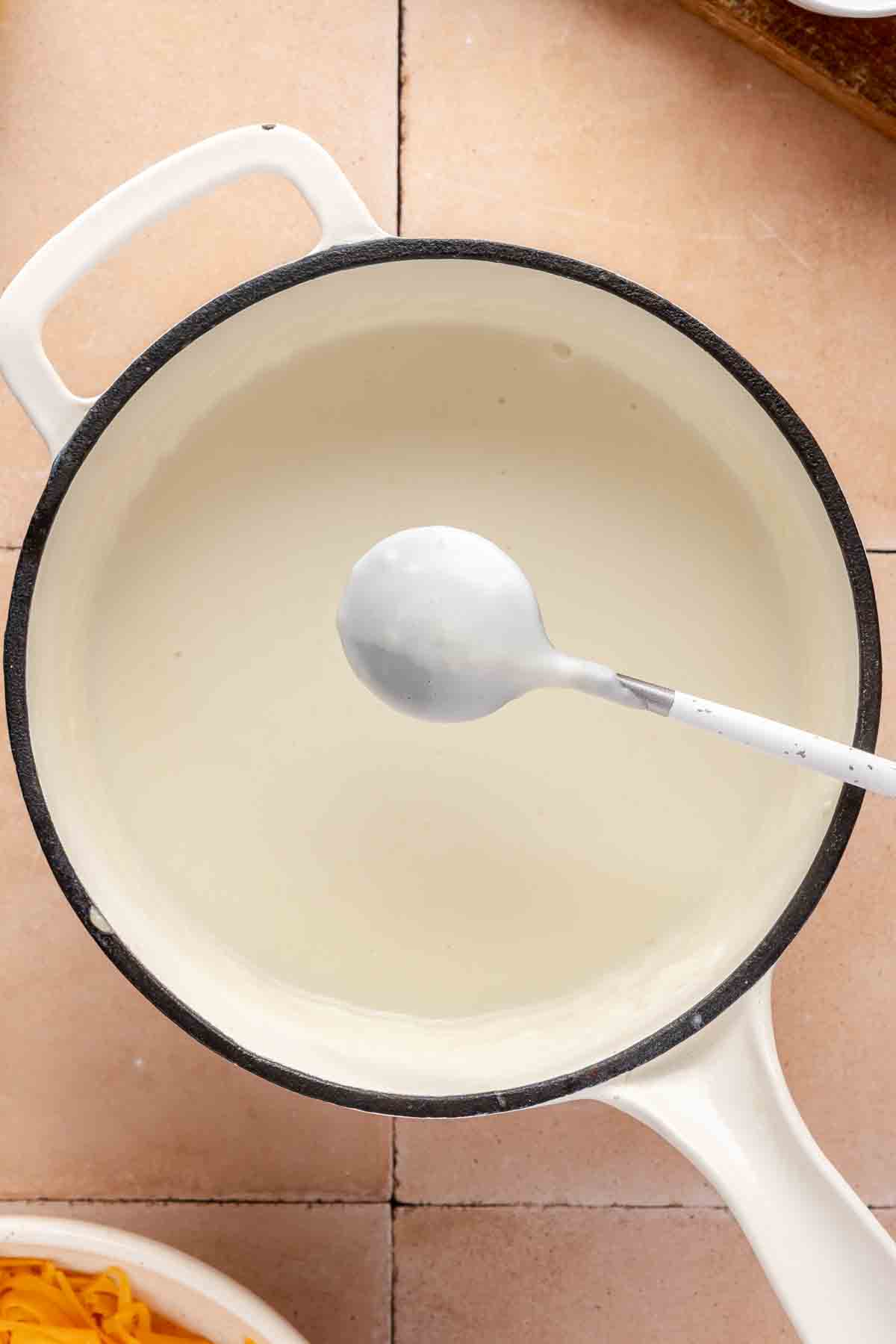 Creamy roux that covers the back of a spoon.