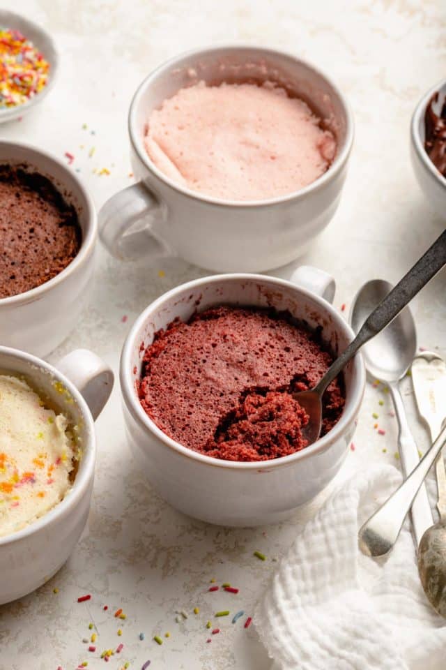 spoon in a red velvet cake mix mug cake