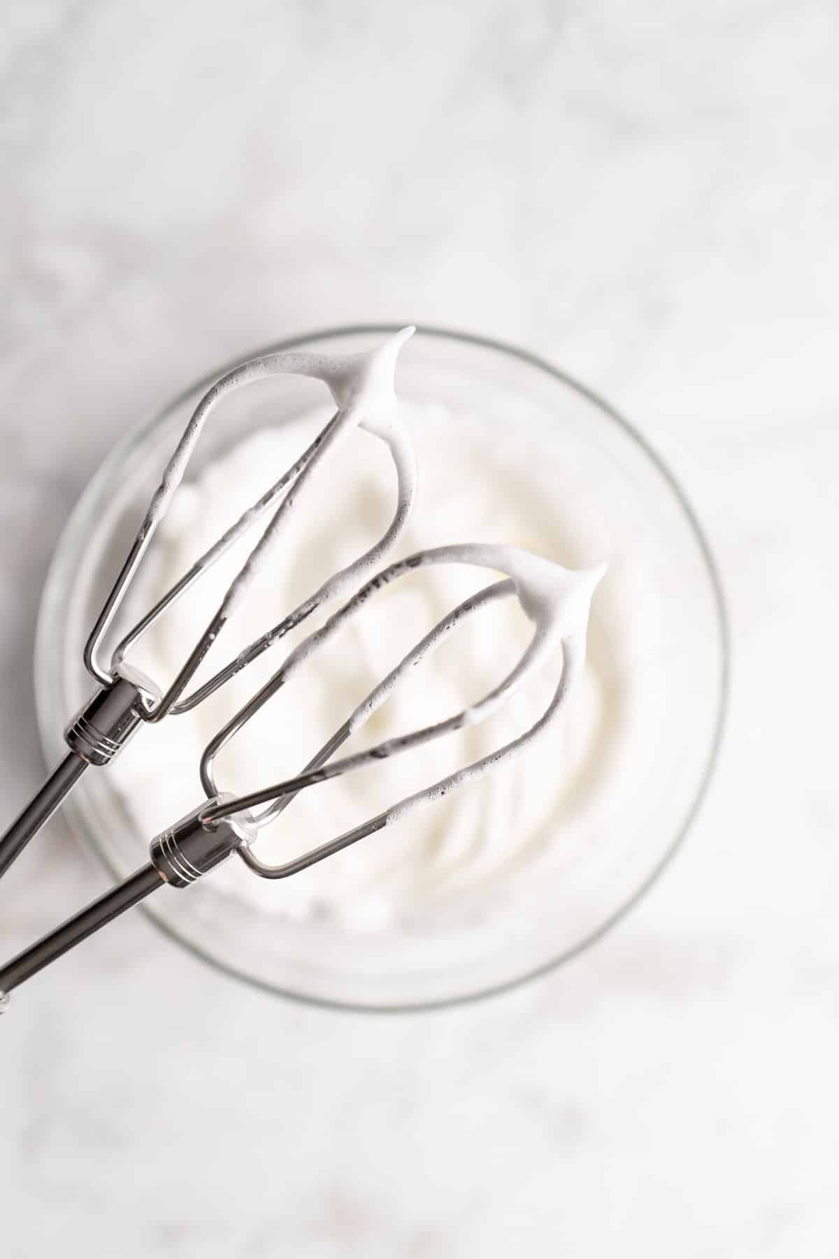 Whipped egg whites on beaters.