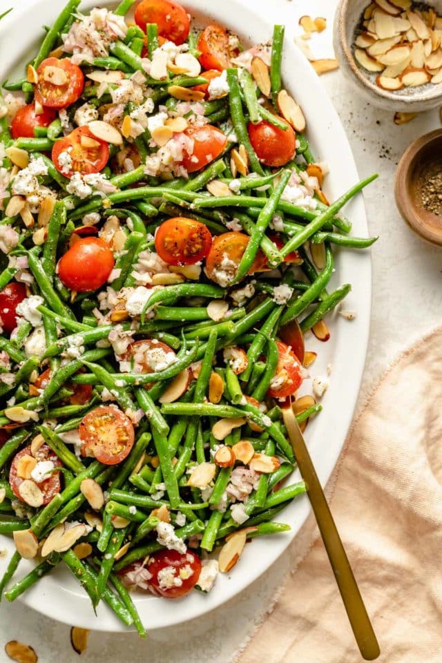 Green bean salad topped with almonds.