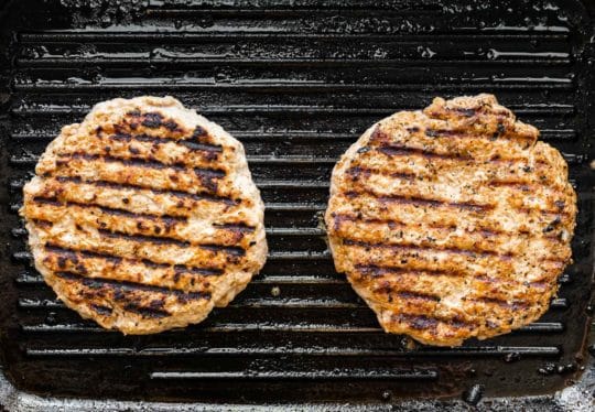 Burger patties on the grill.