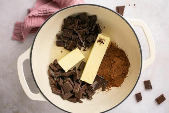 Chocolate, butter and cocoa powder in a large pot.