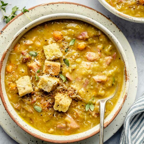 Split pea soup topped with croutons and fresh thyme.